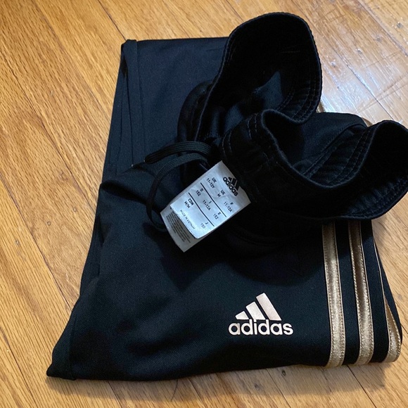 Tiro pants - Adidas Climacool Youth medium pants black with gold stripes. - Picture 8 of 10